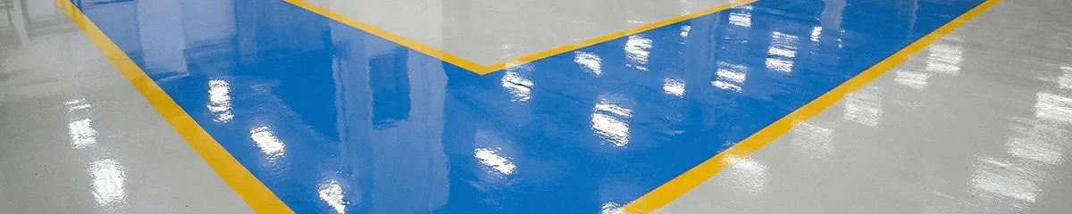 A factory floor professionally covered and marked with epoxy flooring in Overland Park, KS