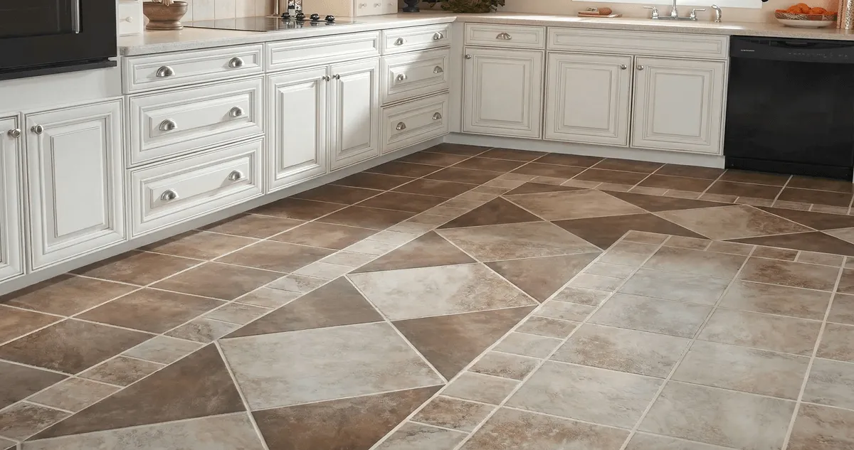 Kitchen with white cabinets and a professionally installed tile floor in Overland Park, KS